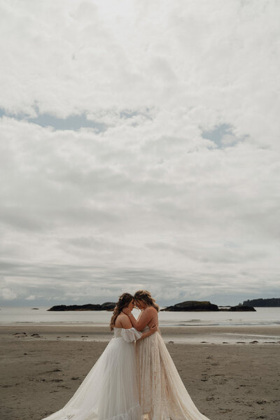 Queer couple during their west coast elopement in Tofino