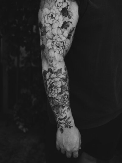 floral tattoo arm