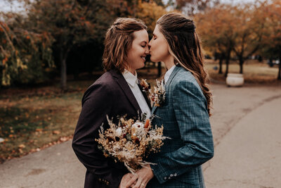 Destination elopement photographer captures  couple kissing after elopement in Nashville