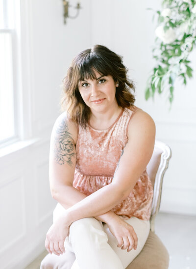 Studio portrait of a female associate photographer