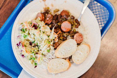 plate of food with slaw and beans and bread