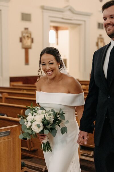 Bride walking down the aisle on wedding day