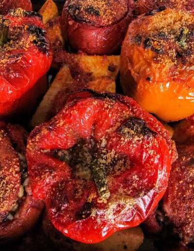 oven roasted stuffed bell peppers and tomatoes.