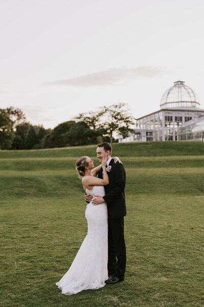bride and groom looking at each other