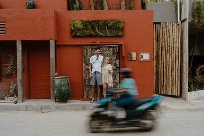 couple standing in streets of Tulum Mexico