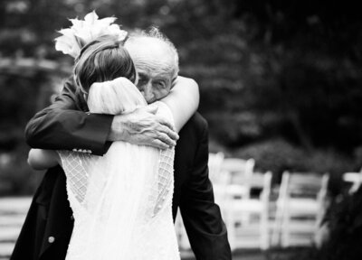 bride hugging grandfather