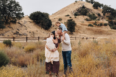 Three siblings dance together on the hills of Walnut Creek