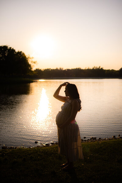 Celebrate the joy of motherhood with a maternity session by Light By Zoey Photography in Champaign-Urbana, IL. Creating elegant and natural portraits that capture this special time in your life.