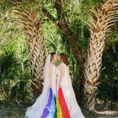 Jackson Hole photographers capture beach bridals with two brides in Florida