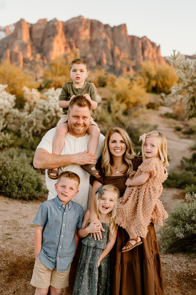 family of six pose in arizona landscape