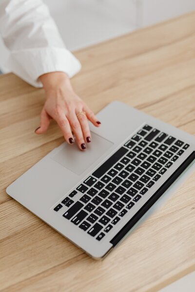 Woman using laptop stock photo