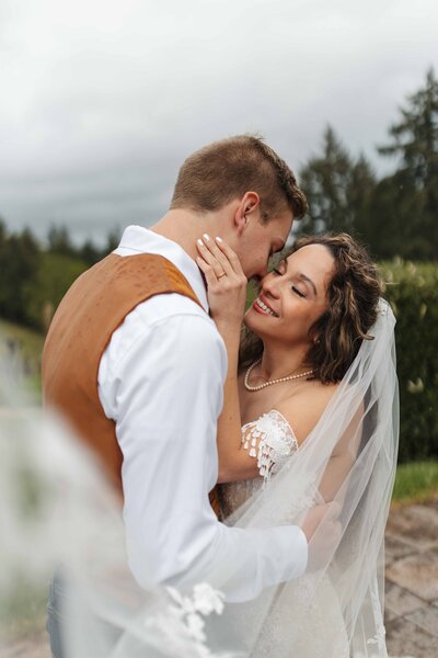 Happy elopement couple with Mount Rainier and a forest as a backdrop
