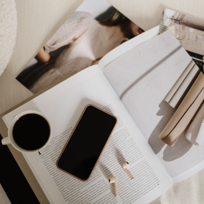 Flatlay with smartphone and notebook — brand development and identity strategy