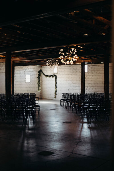 Ceremony setting at warehouse venue