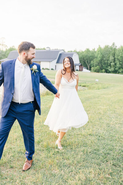 Bride and groom walk up memorial steps at their DC wedding