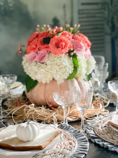 pumpkin-vase-for-roses-as-centerpiece-for-dining-room-table