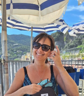 Bea Weir, founder of EnerBea, smiling and welcoming visitors to connect for wholistic healing and vibrational remedies.