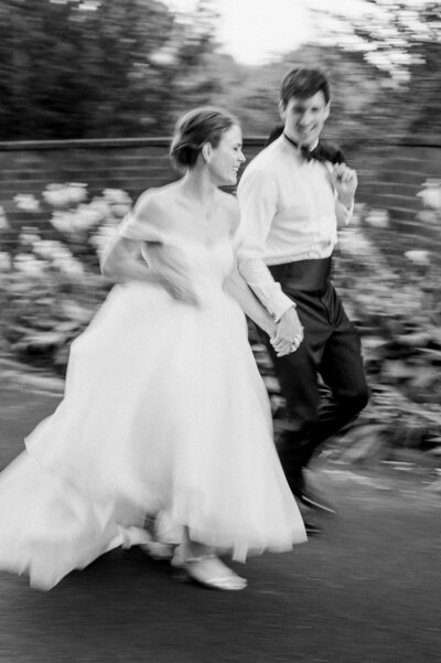Bride and groom walk up memorial steps at their DC wedding