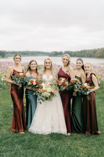 Bride and bridesmaids smiling