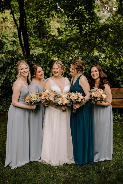 Bride with bridesmaids in blue