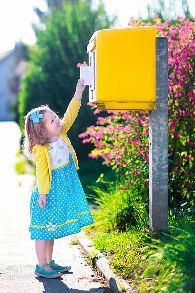 Child with earth ballon, contact us here.