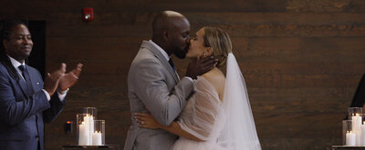 Bride and groom kissing