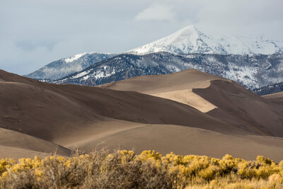 Elite_Travel_Journeys_Great_Sand_Dunes_National_Park_Brush_To_Snow_Capped_Mountains