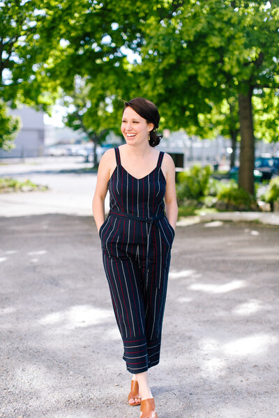 honeybook set up pro caitlyn gray walking on the road smiling