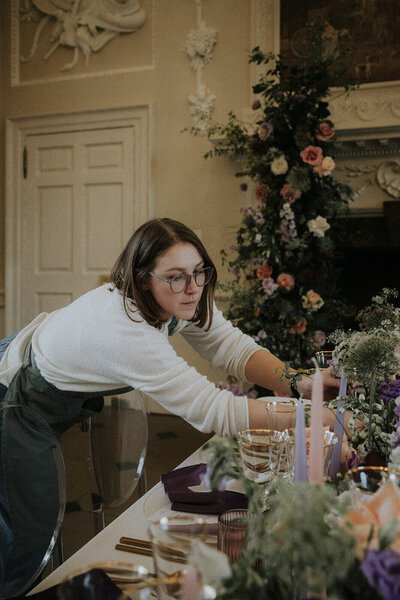 Kelly Vaughan Clinkscale preparing finishing touches to luxury wedding tablescape