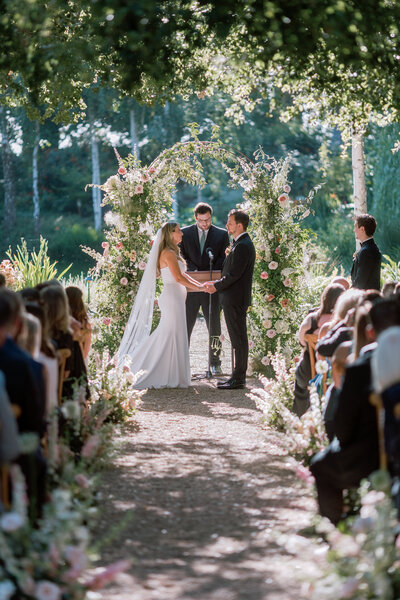 Bride and groom in vineyards at Livermore wedding