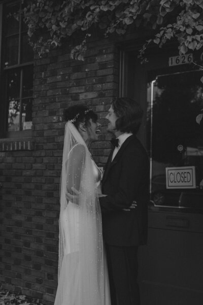 couple embraced in downtown portland for wedding photos