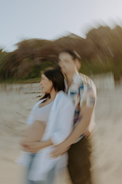 Natural Candid Documentary Family Maternity Baby Pregnancy Announcement Photo shoot at La Jolla Windansea beach at sunset - Couples Mom and Dad San Diego Maternity Photographer