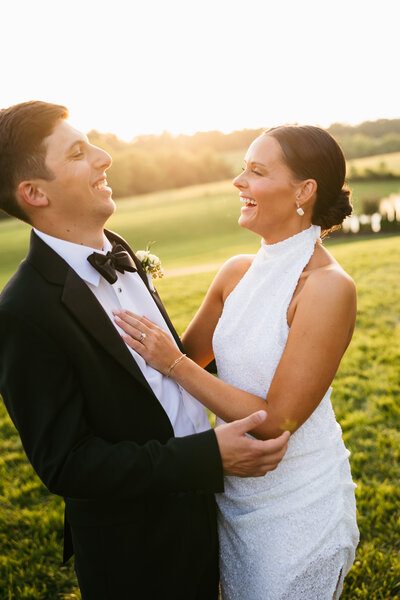 Warm sunset portrait of bride and groom at Nashville vineyard wedding