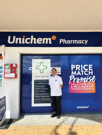 Owner of Unichem Northcote Pharmacy standing in front of store