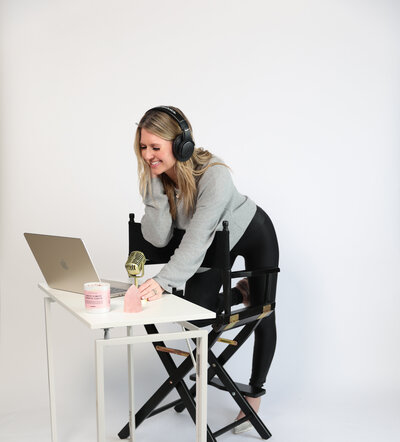 Kelly Maglaya hosting her podcast, sharing empowering insights and tools for women to master their minds, emotions, and create their dream lives.