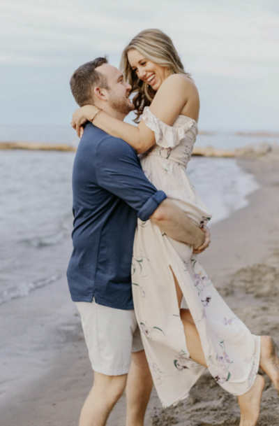 Young teens in the ocean on sufboard