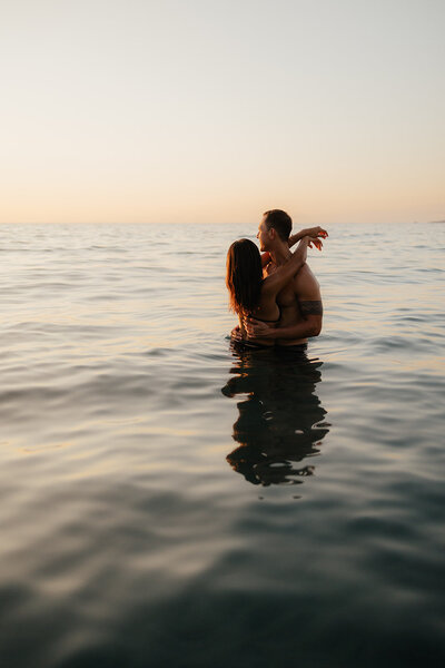 steamy engagement photos in the water