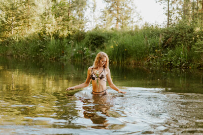 woman posing in river