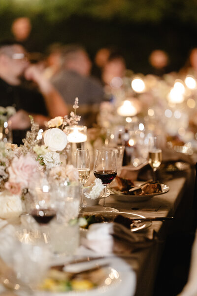 bride and groom standing on the road holding hands