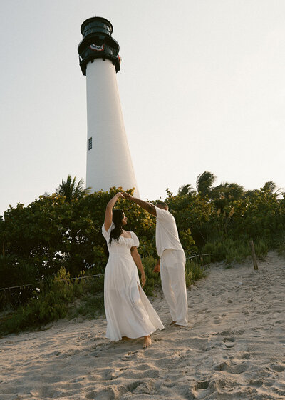 Couples sunset photoshoot with Aliya and Dauson by the Boca Grande lighthouse.