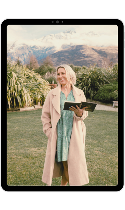 The image of the pricing guide which potential clients can download. The guide has an image of Kirsty the celebrant in front of snow-capped mountains.