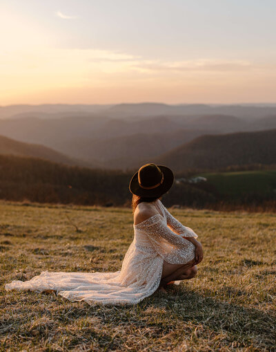 wedding photography on mountain at sunset in gown