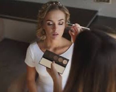 Model having makeup session