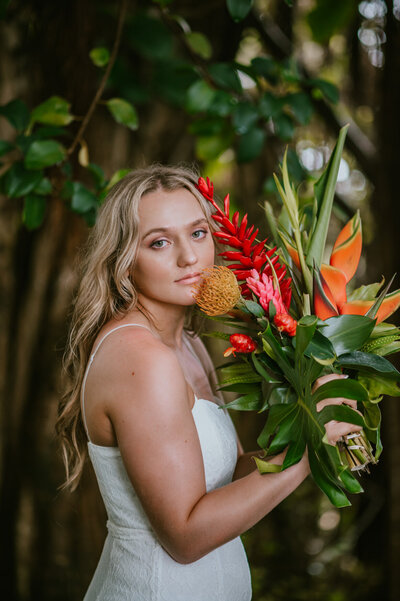 hawaii elopement photography up close shot of tropical hawaiian wedding bouquet