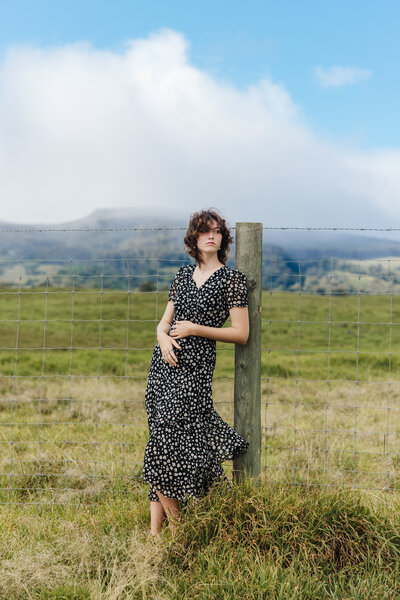 senior photo of girl and grass