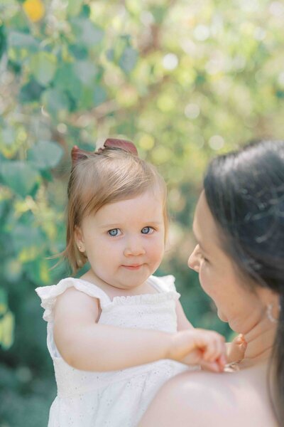 San Diego Family Photographer takes photos of mom and daughter outdoors