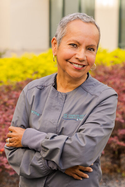 Headshots of Atlanta dentist office team members in gray blouse by brand photographer Laure photography