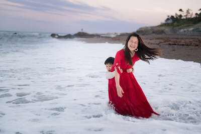 son holding mom during family session