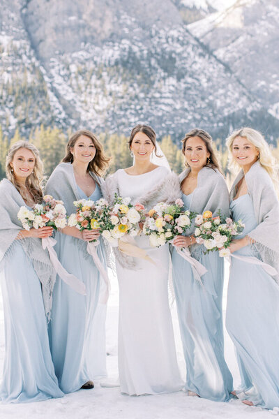 A groups photograph of the brides maids and the bride at a Calgary wedding