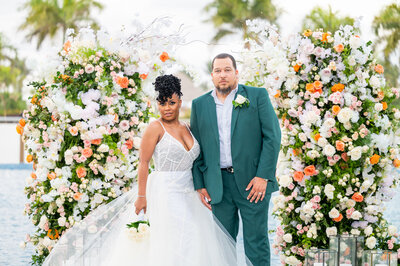 bride and groom in gown and suit